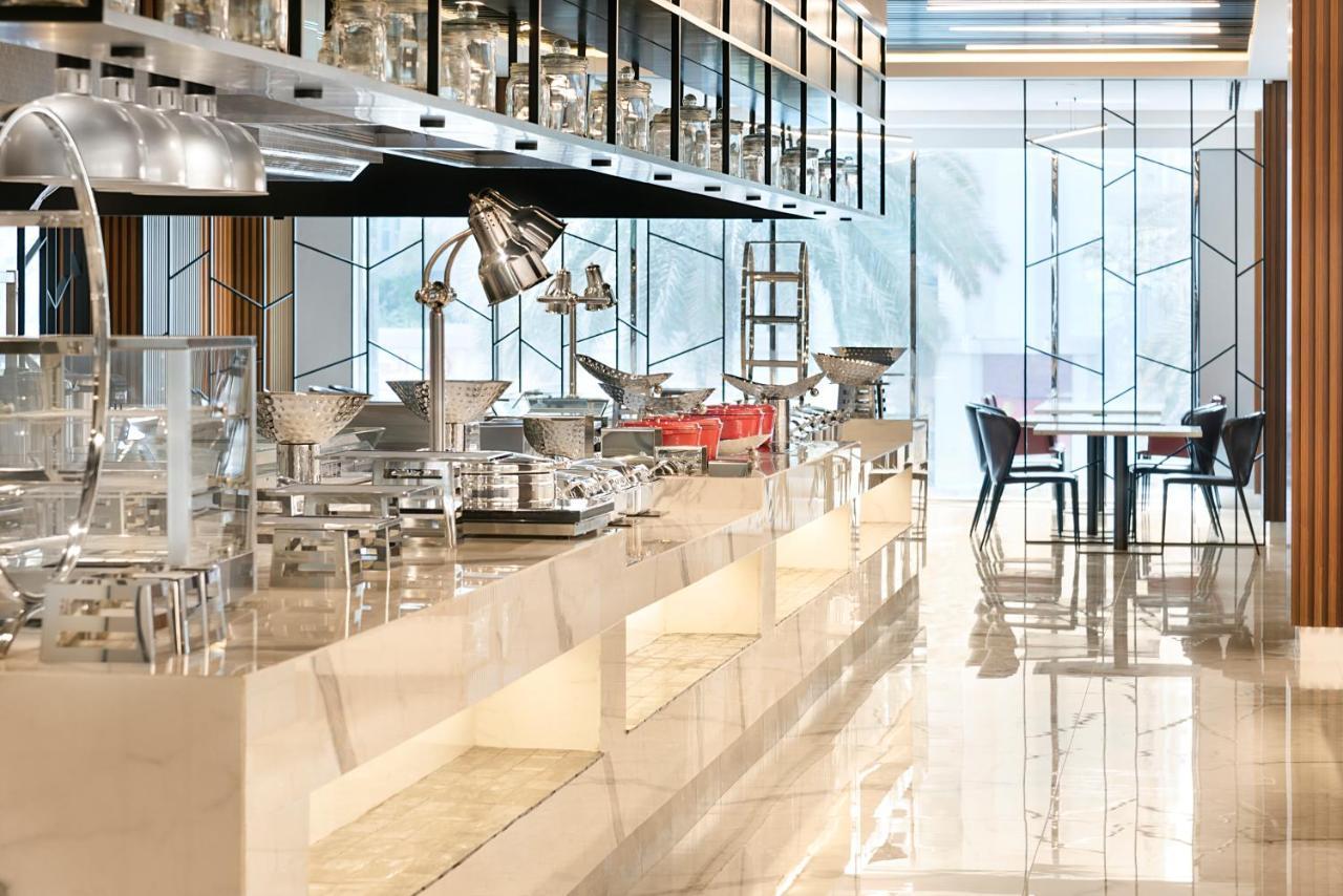 Asiana Grand Hotel Dubai Exterior foto The kitchen at the restaurant