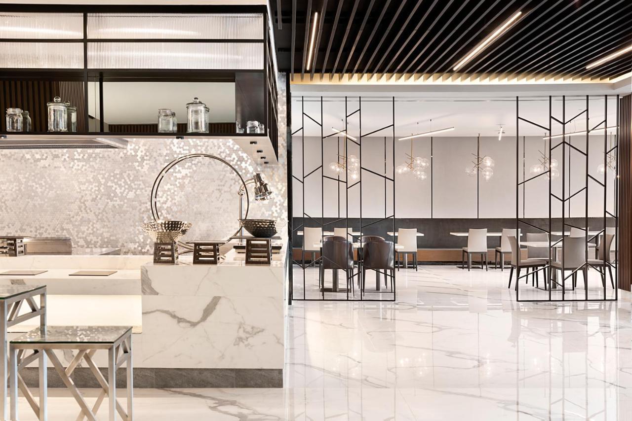 Asiana Grand Hotel Dubai Exterior foto The interior of the restaurant